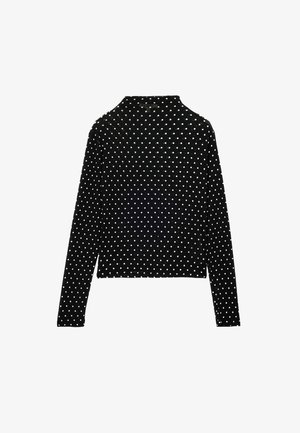 Schwarzes Langarmoberteil mit weißen Polka-Dots, hohem Kragen und figurbetontem Schnitt, von hinten vor einem weißen Hintergrund gezeigt.