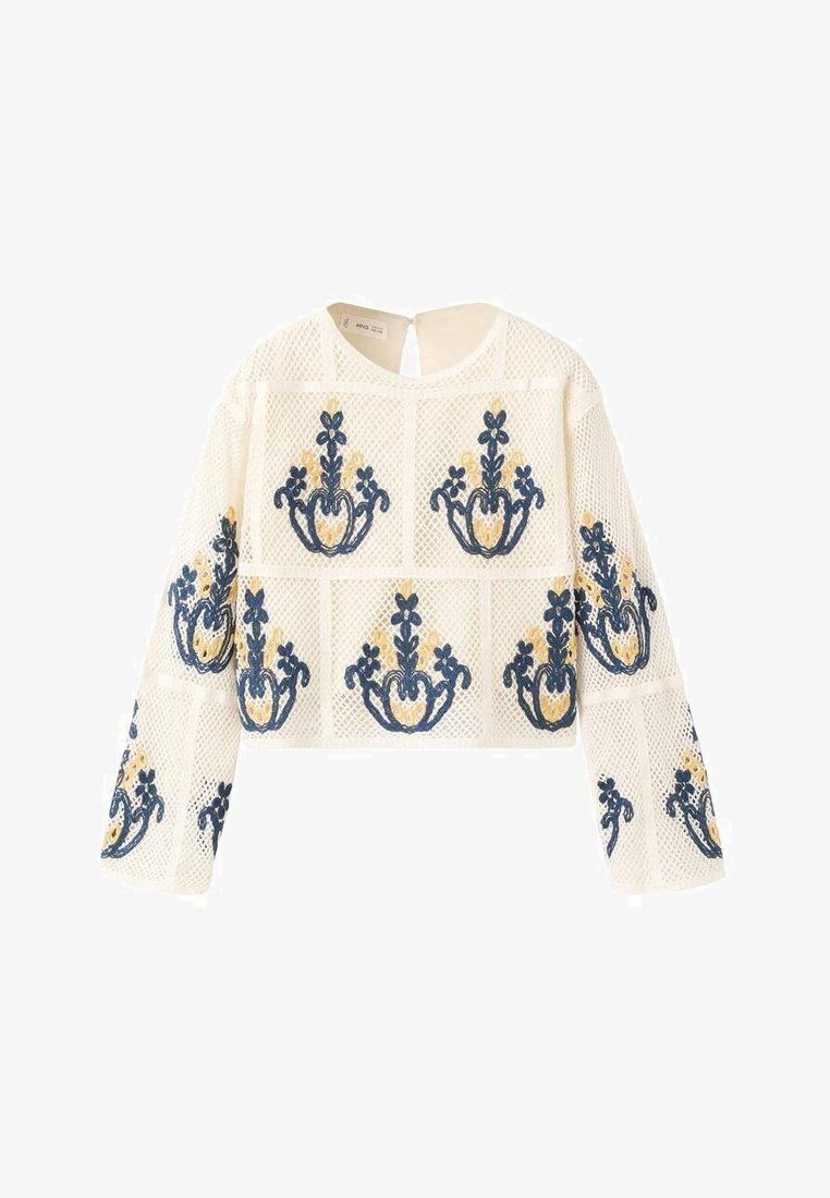 Haut court à manches longues en mesh blanc avec broderie florale bleue et beige en motifs carrés.