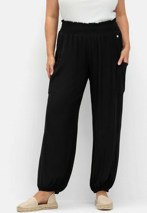 Sheego Tracksuit bottoms - schwarz