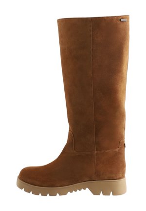 Brown suede knee-high boots with a smooth texture, rubber sole, and a slight heel. Features a seam detail and a logo tag on the side.