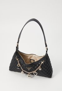 Black quilted handbag with a curved leather strap. Features gold-tone hardware and decorative charms. Beige interior lining with brand label.