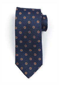 Donkerblauwe stropdas met een gestructureerde stof, voorzien van een klein bloemmotief in bruin en crème. Gevormd met een puntige tip en netjes opgerold.