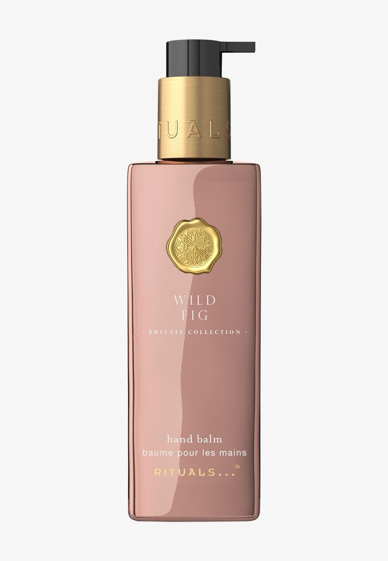 Hohe rechteckige Pumpspender-Flasche mit Wildfeigen-Handbalsam aus der Rituals Private Collection mit gold-schwarzem Spender.