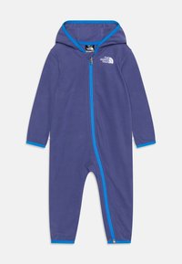 Lila fleeceheldräkt med huva, ljusblå dragkedja och kanter, med långa ärmar och en ledig passform, designad för värme och komfort.