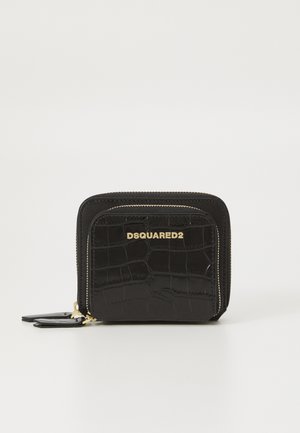 Black zippered wallet made of faux crocodile leather. Features gold branding on the front and a streamlined rectangular shape.