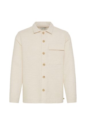 Beige strukturierte Hemdjacke mit Kragen, einer einzelnen Brusttasche und fünf kontrastierenden Knöpfen entlang der Vorderseite. Weicher Stoff.