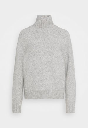 Pull en maille gris clair avec col roulé, manches longues et ourlet à bord côtes. Présente une coupe légèrement oversize avec un tissu texturé.