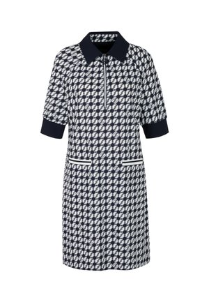 Navy und weiß gemustertes kurzärmliges Kleid mit Kragen, Reißverschluss vorne, zwei Taschen und gerippten Manschetten für zusätzliche Struktur.