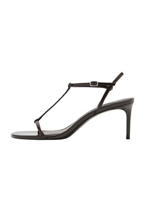 Sandale à talon pour femme en cuir noir brillant, avec une fine lanière en T et une boucle de cheville ajustable, talon moyen mince.