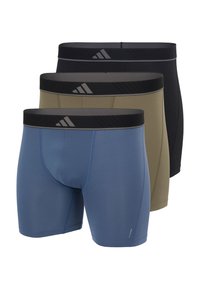 Kolmen miehille tarkoitetun bokserialushousujen pakkaus, jossa on sininen, oliivinvihreä ja musta. Niissä on joustava vyötärönauha, jossa on merkkilogot, ja ne istuvat tiukasti tarjoten tukea.