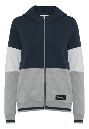 Haut de hoodie zippé léger en marine, gris et blanc. Comprend une poche kangourou, des poignets côtelés et une étiquette de marque sur l'ourlet.