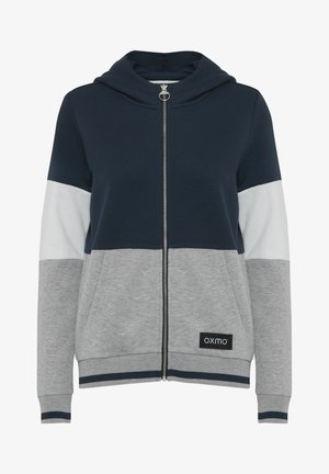 Lettvekts zip-up hettegenser i marineblå, grå og hvit. Har kengurulomme, ribbestrikkede mansjetter og et merketikett på kanten.