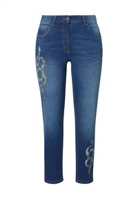 Tmavě modré džínové kalhoty slim fit, s kovovým výšivkou hada na levém stehně, pěti kapsami a zapínáním na knoflík.