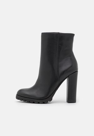 Bottines à talons hauts - black