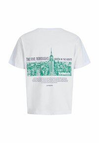 White cotton t-shirt featuring a green skyline graphic, text reading "The Five Boroughs" with the Empire State Building prominently displayed.