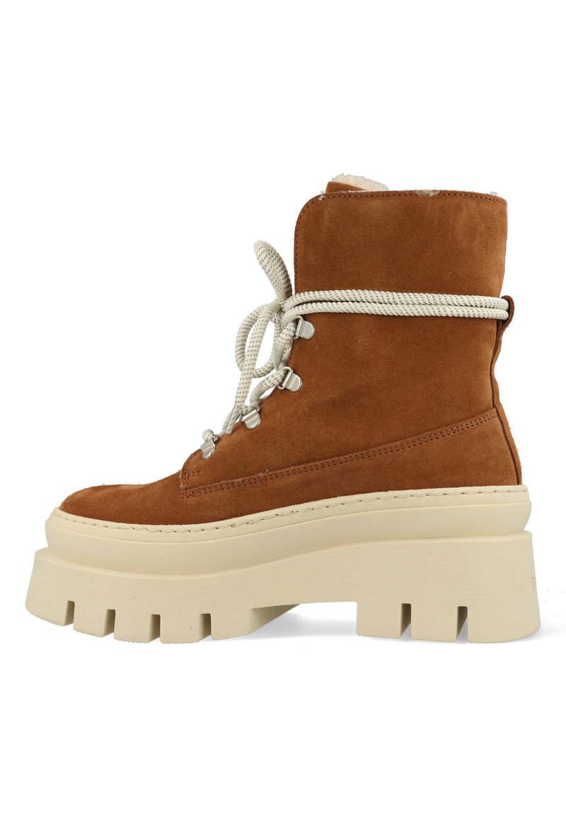 Bruine suede veterschoenen met een crèmekleurige plateauzool. Voorzien van zilveren hardware, gestructureerde veters en een hoge snit met een zachte voering.