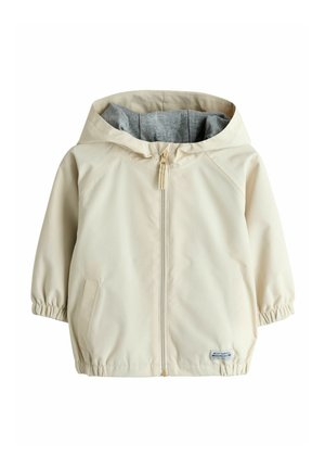 Chaqueta infantil con capucha de color crema, forro gris, cremallera frontal, puños elásticos y bolsillos.