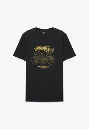 T-shirt nera in cotone con grafica di motocicletta vintage dorata e testo "Authentic Vintage Motors" con dettagli di design. Taglia XL.