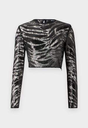 Černý dlouhý rukáv crop top s texturovaným, metalickým stříbrným vzorem a kulatým výstřihem, s uzavíráním na zip na zadní straně.