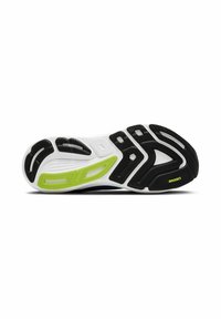 Suola di scarpa sportiva in bianco e nero con accenti verdi, dotata di gomma testurizzata per una migliore presa e scanalature flessibili per un movimento potenziato.