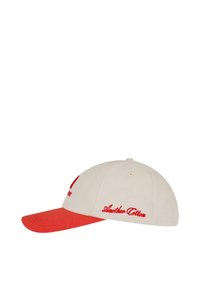 Beige színű baseball sapka piros napernyővel. Piros hímzett szöveg található az elején és az oldalon. Pamut anyagból készült, strukturált dizájnnal.
