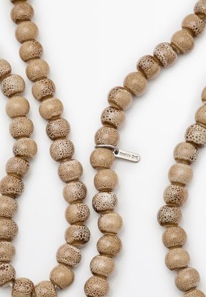 Beaded necklace made of textured, light brown material with varied speckled patterns. Includes a small silver tag attached.