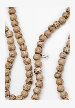 Beaded necklace made of textured, light brown material with varied speckled patterns. Includes a small silver tag attached.