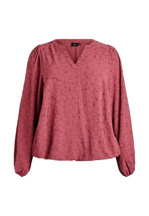 Blůza v barvě rzi s výstřihem do V, dlouhými nabíranými rukávy a květinovým vzorem. Vyrobena z měkké látky s jemnou strukturou a nabíraným detailem na manžetách.