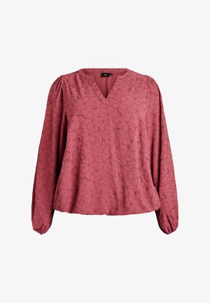 Bluzica v rjavi barvi z V-izrezom, dolgimi napihnjenimi rokavi in cvetličnim vzorcem. Narejena iz mehkega blaga z rahlo teksturo in nabranimi detajli na manšetah.