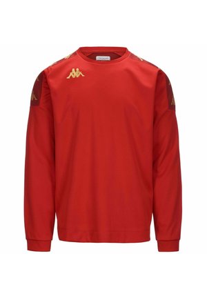Rode langarmshirt van een gladde stof. Voorzien van gouden logo-accenten op de schouders. Geribbelde boorden en halslijn.