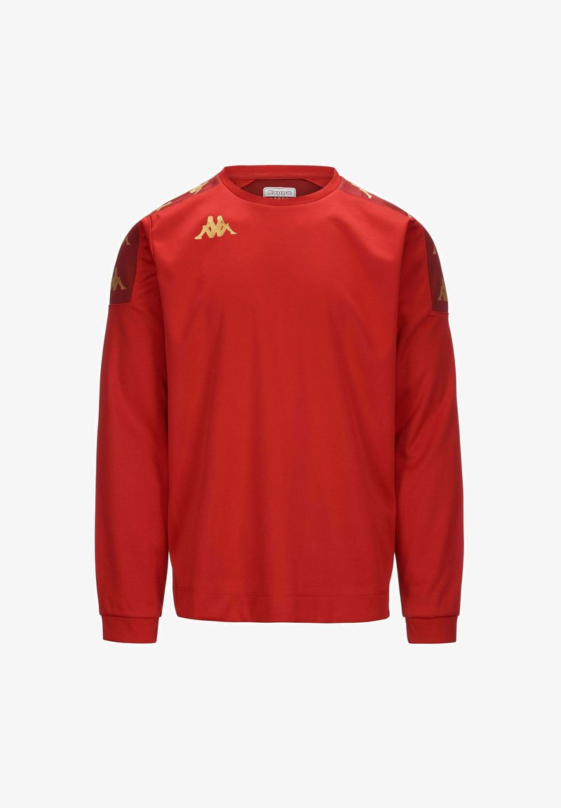 Camisa roja de manga larga hecha de un tejido suave. Presenta acentos de logotipos dorados en los hombros. Puños y escote acanalados.