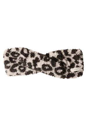 Bandeau doux et duveteux avec motif léopard noir et blanc et petite étiquette rectangulaire sur un côté.