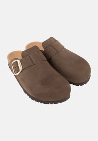 Brown suede clogs with a smooth finish, featuring a wide strap and a gold-tone buckle. Thick black rubber sole for traction.