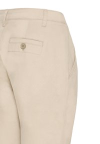 Kergedest kleit kerge kangaga. Omab tagumist taskut nupukinnitusega. Sile tekstuur, kohandatud sobivus ja neutraalne värv.