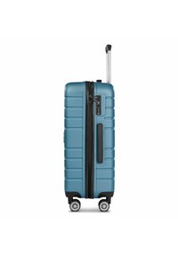 Harde koffer in teal met ribbelstructuur, een zwarte rits, combinat slot, uitschuifbare handgreep en vier wielen voor stabiliteit.