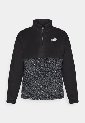 Black fleece pullover with a quarter zipper. Features upper solid black section and lower leopard print in shades of gray. Puma logo on chest.