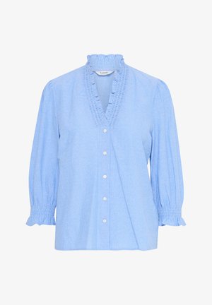 Világoskék gombos ing függőleges fehér csíkokkal. Ráncos gallérral és gumírozott puffujjakkal rendelkezik, puha anyagból készült.