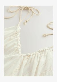 Sélectionné, ecru with gold sparkle stripe