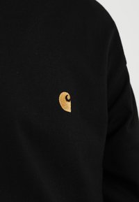 Carhartt WIP CHASE - Hosszú ujjú felső - black/gold