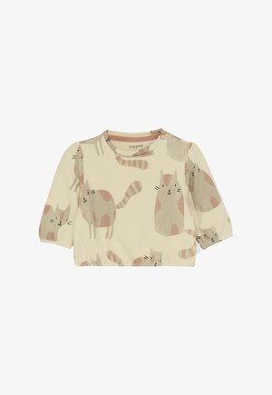 Camiseta de bebé de manga larga en color crema con dobladillo elástico e ilustraciones de gatos en tonos rosa-beige por toda la prenda.