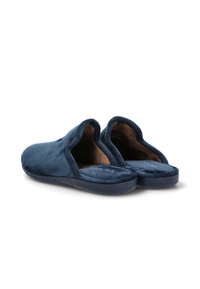 Zapatillas de color azul marino con una textura suave y esponjosa, diseño de espalda abierta, plantilla acolchada y suela de goma flexible.