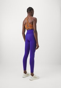Puma SHAPELUXE SEAMLESS - Leggingek - lapis lazuli