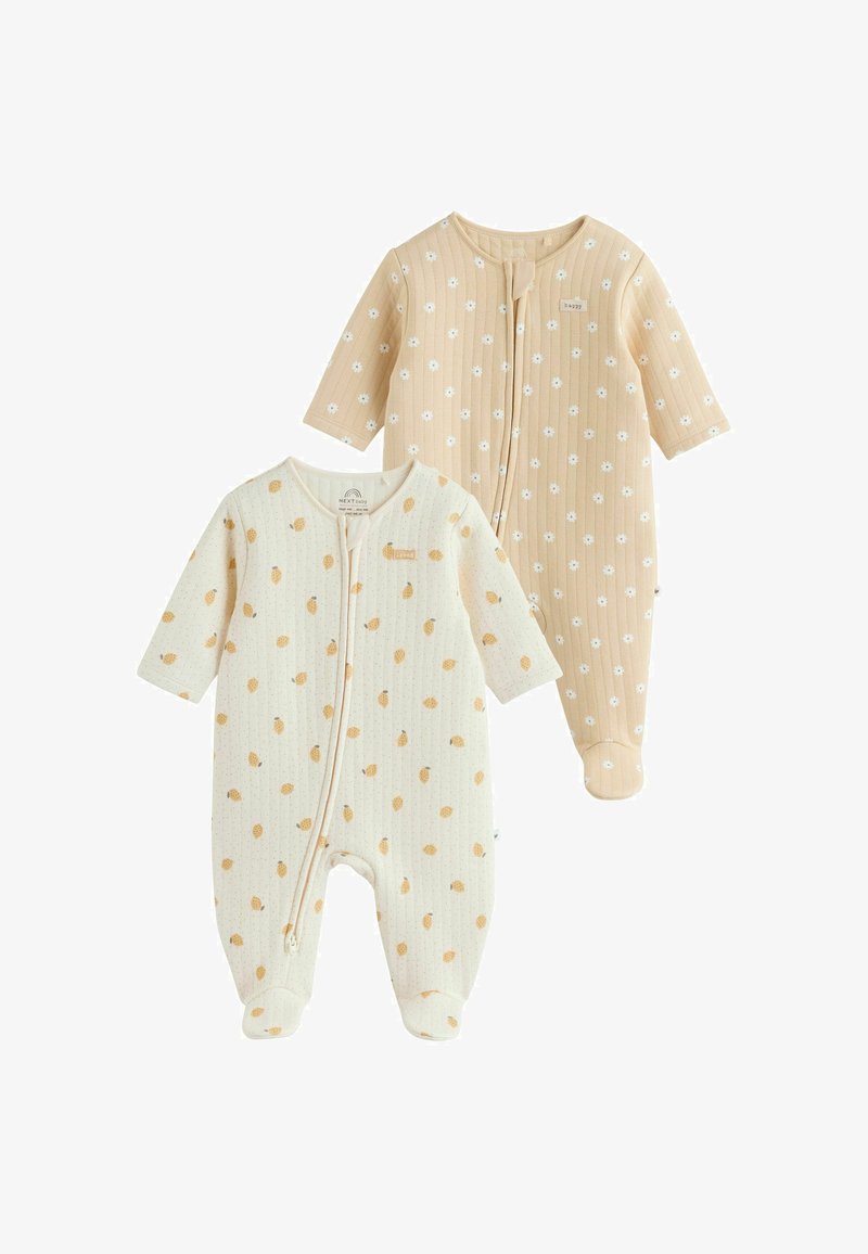 Deux grenouillères pour bébé à manches longues avec pieds, une crème à pois marron, une beige à fleurs blanches, toutes deux dotées de fermetures éclair à l'avant.