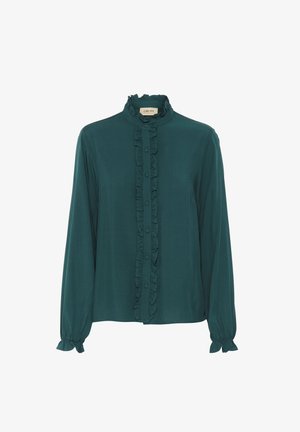 Vihreä sininen paita pitkillä hihoilla, röyhelöillä varustettu etuosa, napitettava kiinnitys ja kootut hihansuut. Sujuva kangas, jossa on muotoiltu kaulus.