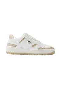 White sneaker with beige accents, leather and suede materials, rounded toe, textured rubber sole, and logo on the side.