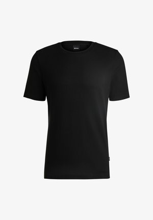 Black short-sleeve t-shirt made of textured fabric with a round neckline. Features a logo tag on the lower side.
