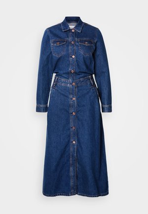 Denim shirt dress with a button-down front, two chest pockets, long sleeves, and a fitted waist, in a deep blue color with contrast stitching.