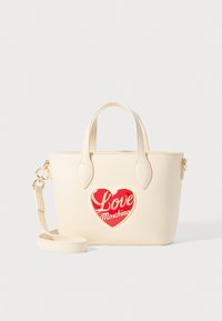 Cream-colored faux leather handbag with short handles, gold hardware, and a red heart-shaped logo with "Love Moschino" text.
