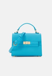 Turquoise structured handbag with a textured finish, gold hardware, a top handle, and a detachable shoulder strap.