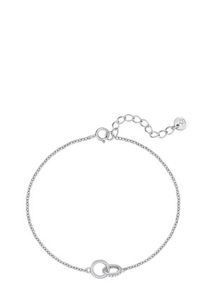 Pulsera delicada de cadena de plata con dos dijes circulares entrelazados, uno incrustado con pequeños cristales claros y cierre de langosta con extensor.